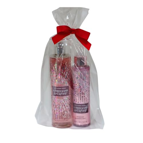 Bath & Body Works A Thousand Wishes Fine Fragrance Body Mist 8 oz & A Thousand Wishes Fine Fragrance Shimmer Body Mist 4.9 oz Gift Set packaging with a Red bow