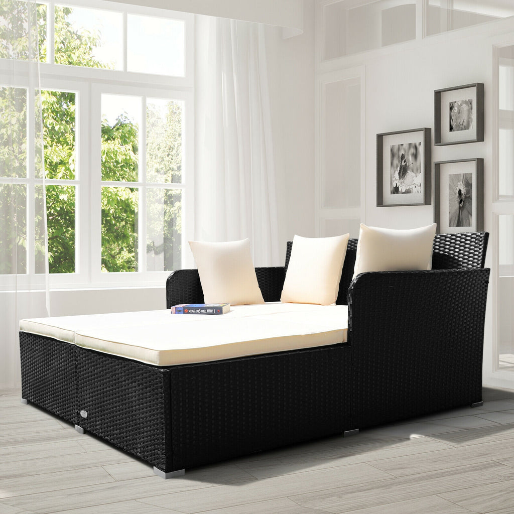 Spacious Outdoor Rattan Daybed with Upholstered Cushions and Pillows