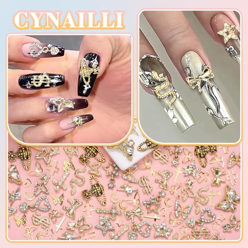 320 Pcs 3D Gold Nail Charms, Cross Snake Star Heart Dangle Nail Gems Charms, Bow Planet Dollar Butterfy Nail Gems for Alloy Nails, Rivet Nail Charms Rhinestones for Nails Art DIY Design