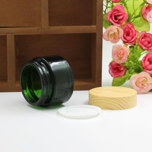 4Pack 50g Green Glass Cosmetic Cream Jars, Empty Sample Jars Containers Pot with Wood Grain Lids for Lotion, Lip Balm, Eye Cream, Scrubs, Oils, Salves, Ointments