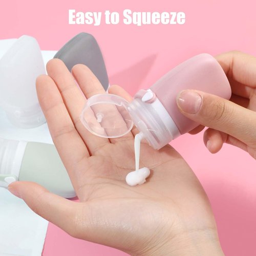 WXOIEOD 2 oz Silicone Travel Bottles, Leakproof Squeeze Bottle Mini Travel Size Container for Toiletries Lotion Shampoo and Conditioner Liquid Salad Dressing to go Condiment, TSA Approved, 4 Pack