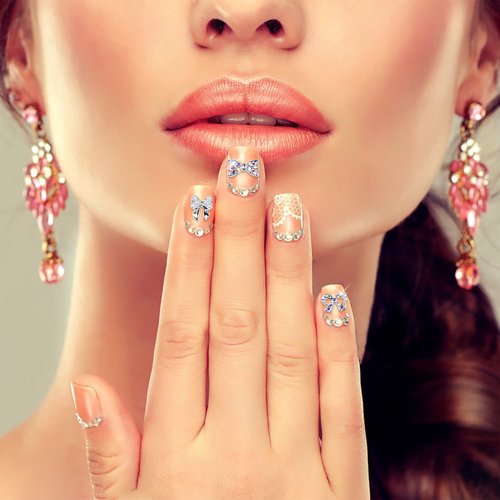 JERCLITY 33 Pcs Silver Alloy Bow Charms for Nails Bow Nail Charms Gems Bowknot Nail Studs Inlaid Pearl Clear Iridescent Rhinestone for Women Nail Art
