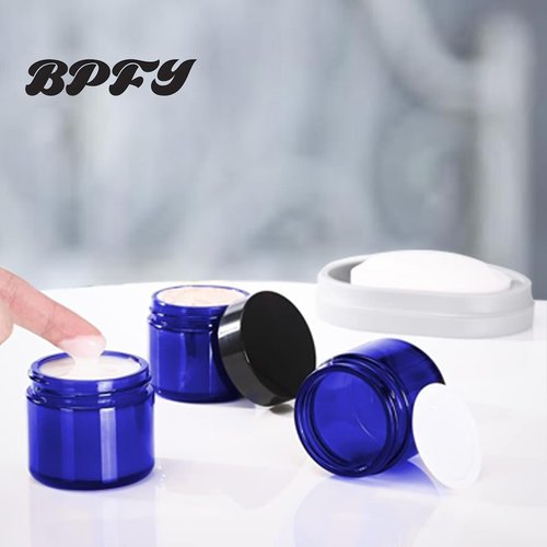 BPFY 24 Pack 2 oz Round Blue Glass Cosmetic Jars with Inner Liners and Black Lids, Travel Jars, Refillable Containers for Makeup, Cream, Lotion, Sugar Scrubs, Eye Shadow, Slime, Paint, Jewelry