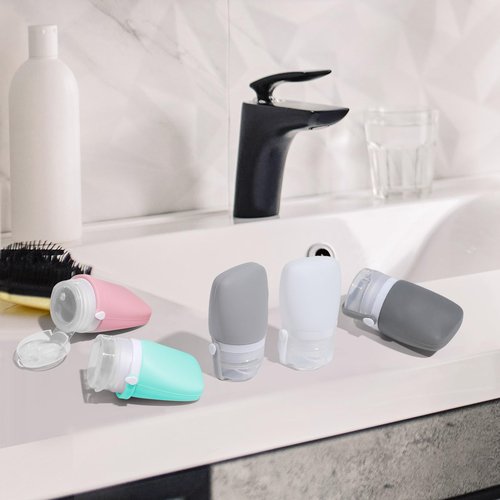 WXOIEOD 2 oz Silicone Travel Bottles, Leakproof Squeeze Bottle Mini Travel Size Container for Toiletries Lotion Shampoo and Conditioner Liquid Salad Dressing to go Condiment, TSA Approved, 4 Pack