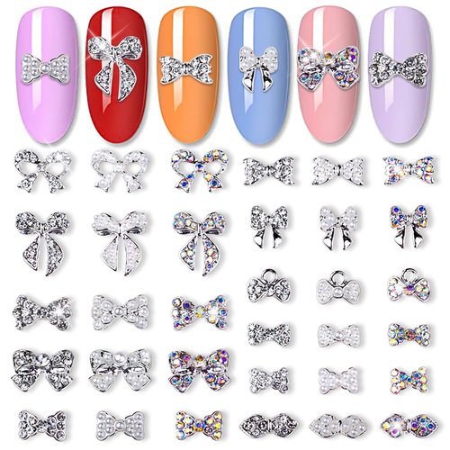 JERCLITY 33 Pcs Silver Alloy Bow Charms for Nails Bow Nail Charms Gems Bowknot Nail Studs Inlaid Pearl Clear Iridescent Rhinestone for Women Nail Art