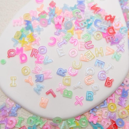 300Pcs Letter Nail Art Charms Random Candy Color Letter Resin Nail Rhinestones Kawaii Mini Flatback Alphabet Nail Gems with Aurora Glitter Design Nail Art Accessories for DIY Craft Nail Supplies