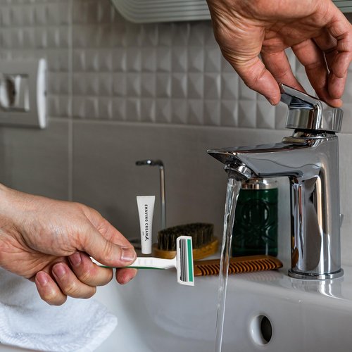 50 Pack Shave kit in Bulk 3 Blades Shave Disposable Razor with Protective Cap 12g Cream Individually Wrapped Paper Box for Hotel,Airbnb, Homeless,Shelter Camping Travel On The Go
