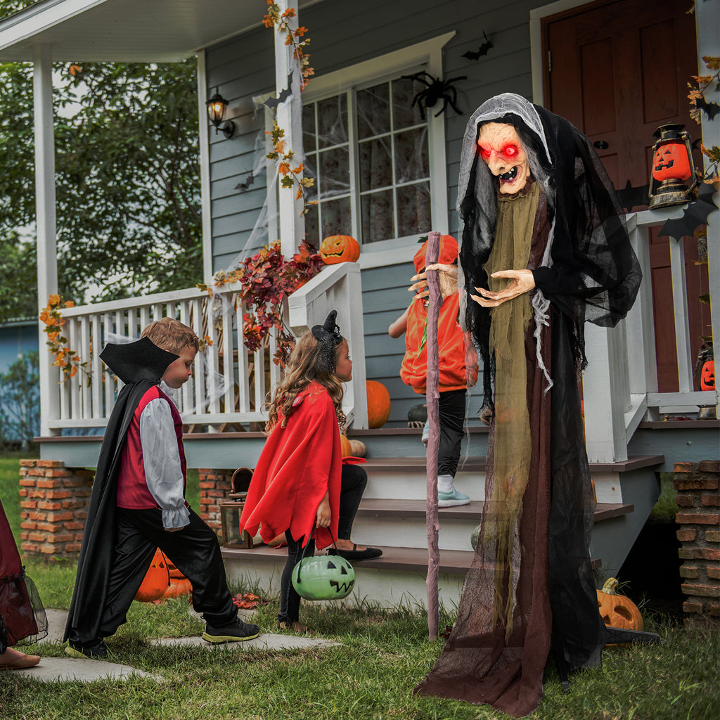 Life Size Animatronic Witch with Pre-Recorded Scary Phrases - Witch with Crutch