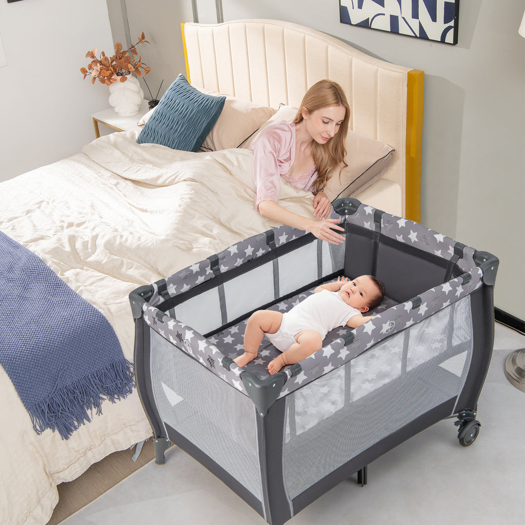 Gray Portable Baby Playard with Changing Table, Bassinet & Music Box